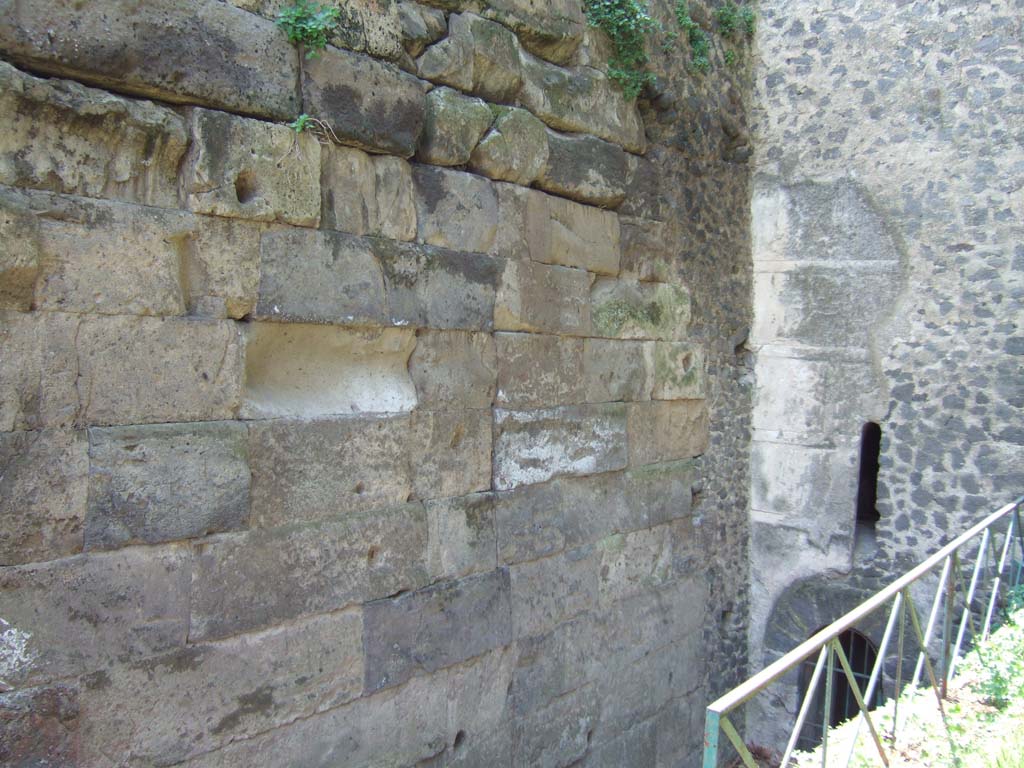 Vesuvian Gate Pompeii. May 2006. Wall to left of Tower X showing impact by war machines used by Sulla. 