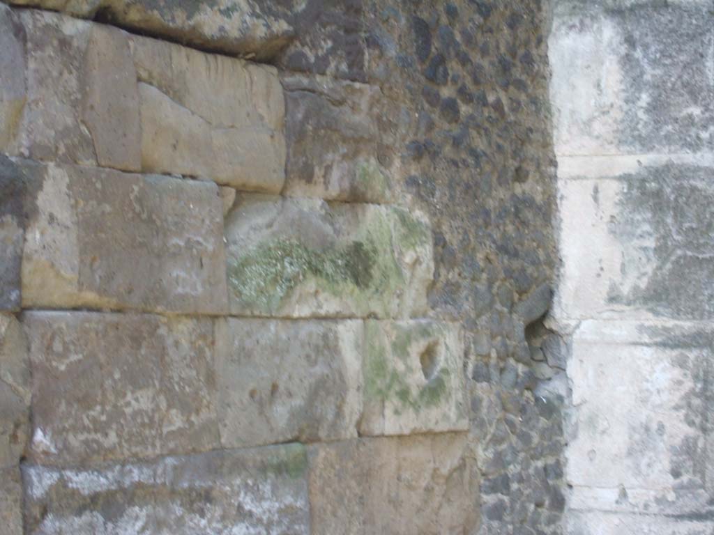 Vesuvian Gate Pompeii. May 2006. Wall to left of Tower X showing impact by war machines used by Sulla. 