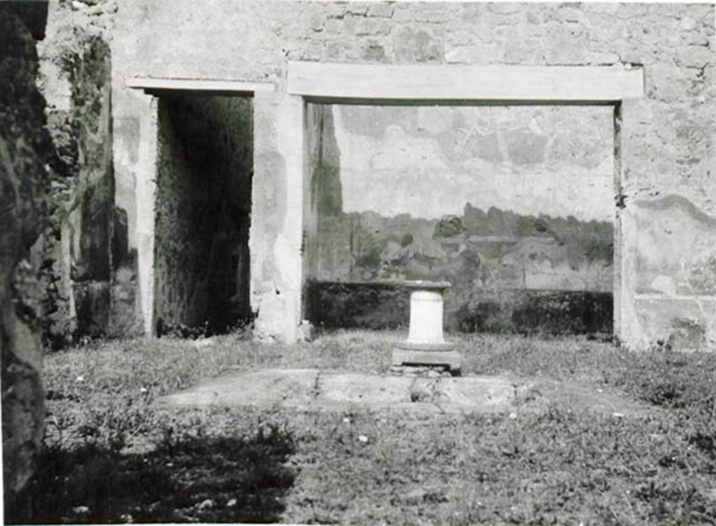 I.2.10 Pompeii. 1935 photo taken by Tatiana Warscher. Looking east across impluvium in atrium, towards doorway to corridor to rear, on left, and tablinum, on right.
See Warscher T., 1935. Codex Topographicus Pompeianus: Regio I.2. (no.21), Rome: DAIR, whose copyright it remains.
