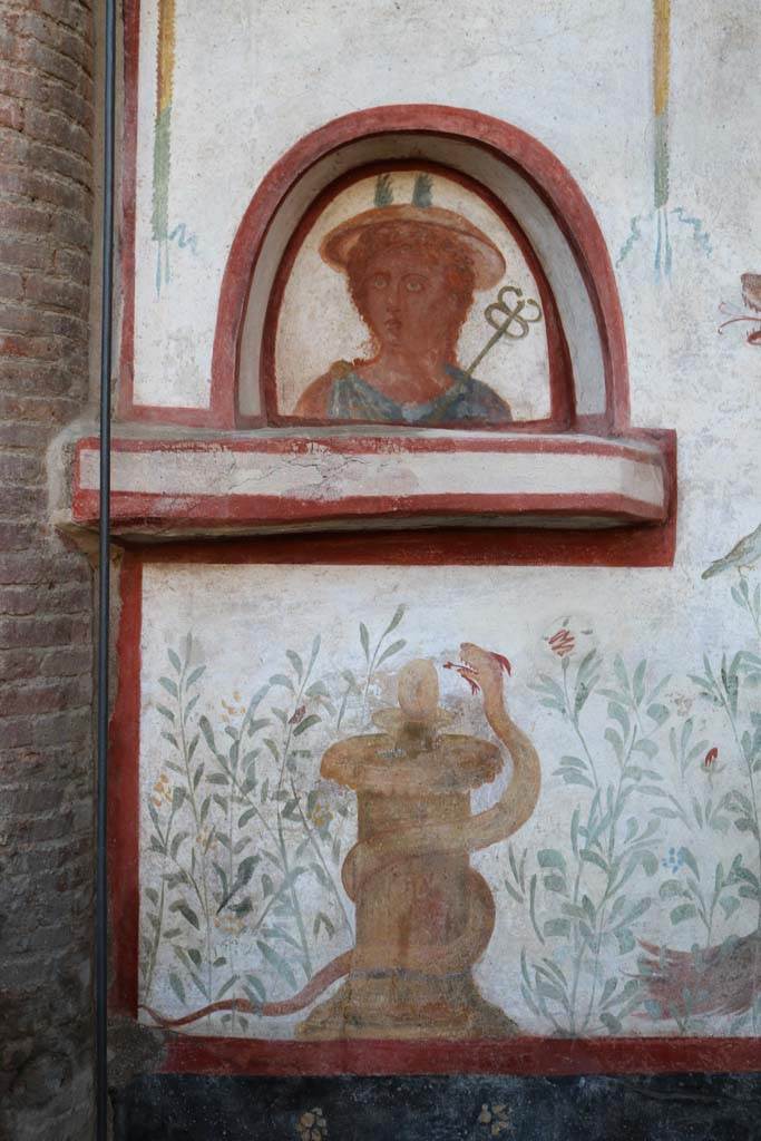 I.6.2 Pompeii. December 2018. 
Detail from south end of lararium on west wall. Photo courtesy of Aude Durand.
