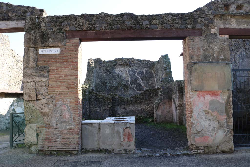 I.7.8 Pompeii. December 2018. Looking towards entrance on south side of Via dellAbbondanza. Photo courtesy of Aude Durand.
