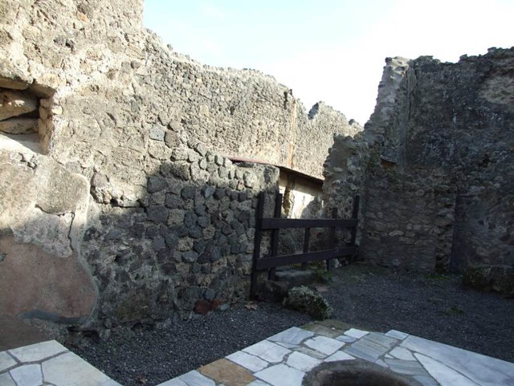 I.7.8 Pompeii. December 2007. East wall of shop, and with entrance 1.7.9 in east wall of rear room.