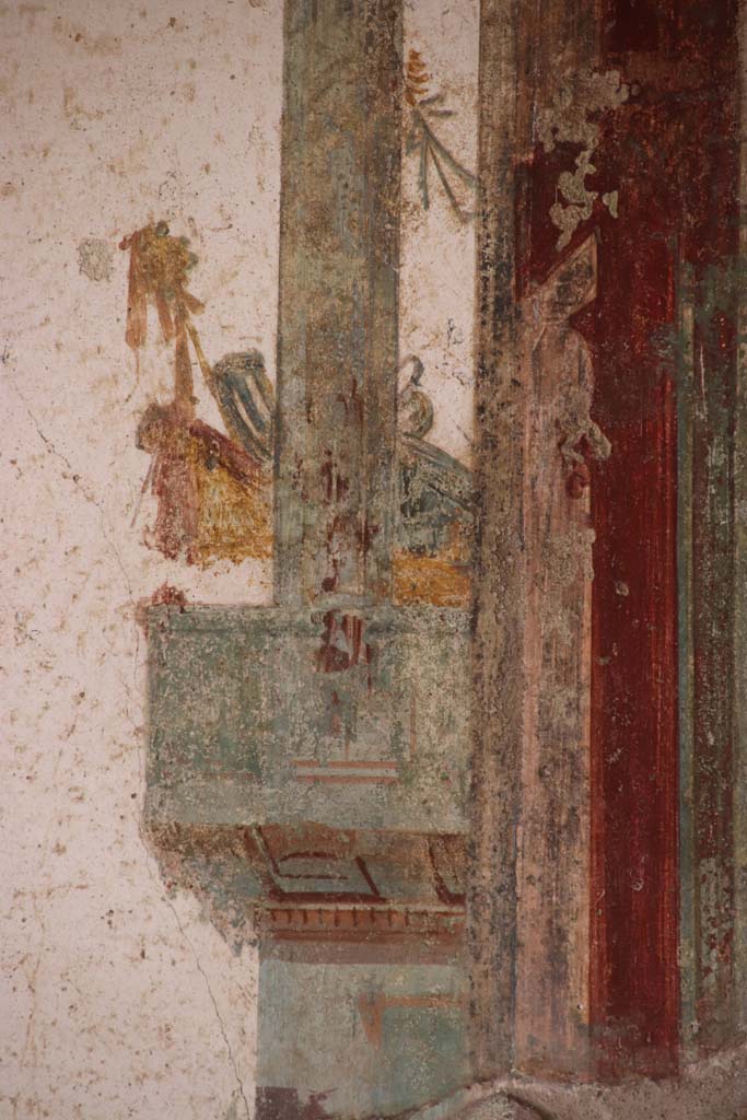 I.7.11 Pompeii. September 2021. 
Detail from painted panel on west wall towards south end of triclinium. Photo courtesy of Klaus Heese.
