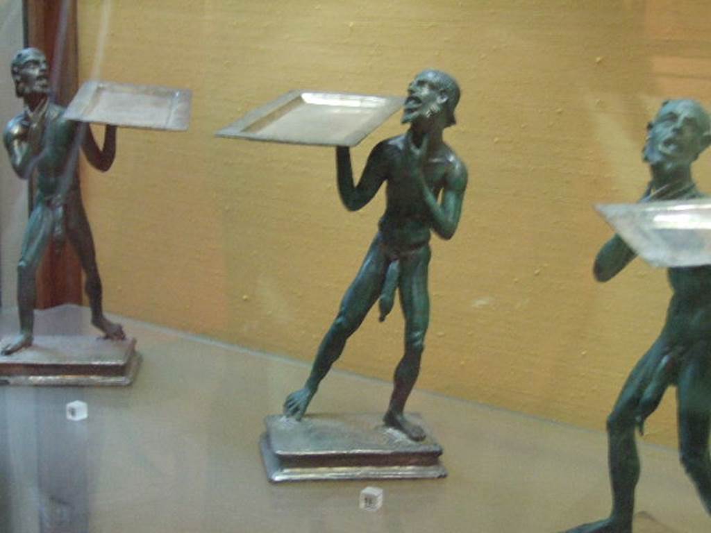 Bronze statues found in I.7.10-12.  Now in Naples Archaeological Museum