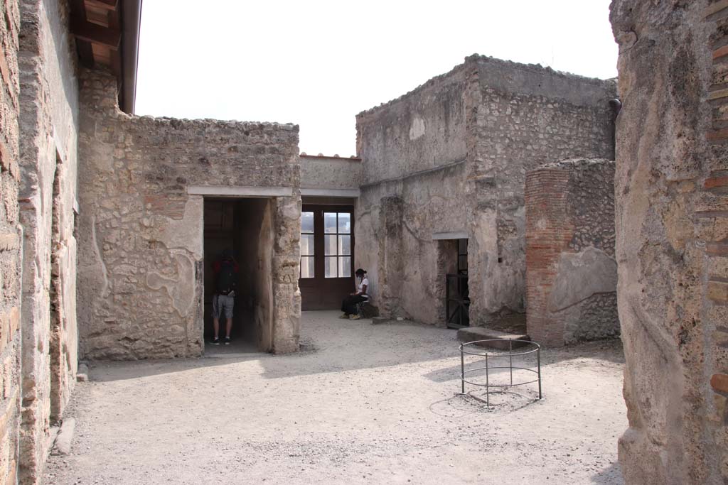 I.7.11 Pompeii. September 2021. Looking south across atrium from near lararium. Photo courtesy of Klaus Heese.