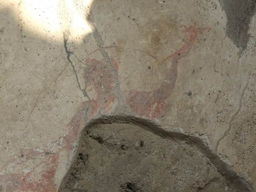 I.7.11 Pompeii. December 2006.  Remains of Lar, from the right hand side of the Genius, on Lararium on east side of atrium.

