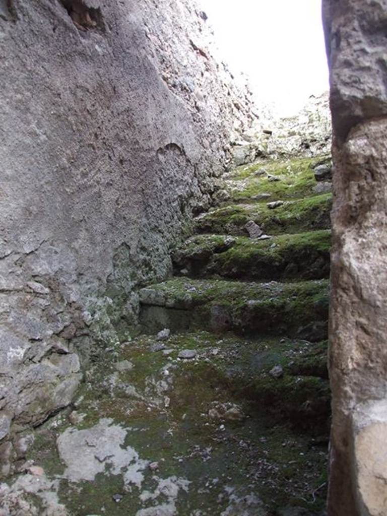 I.7.11 Pompeii. December 2006. Stairs to the upper floor, on the north wall in I.7.10.
