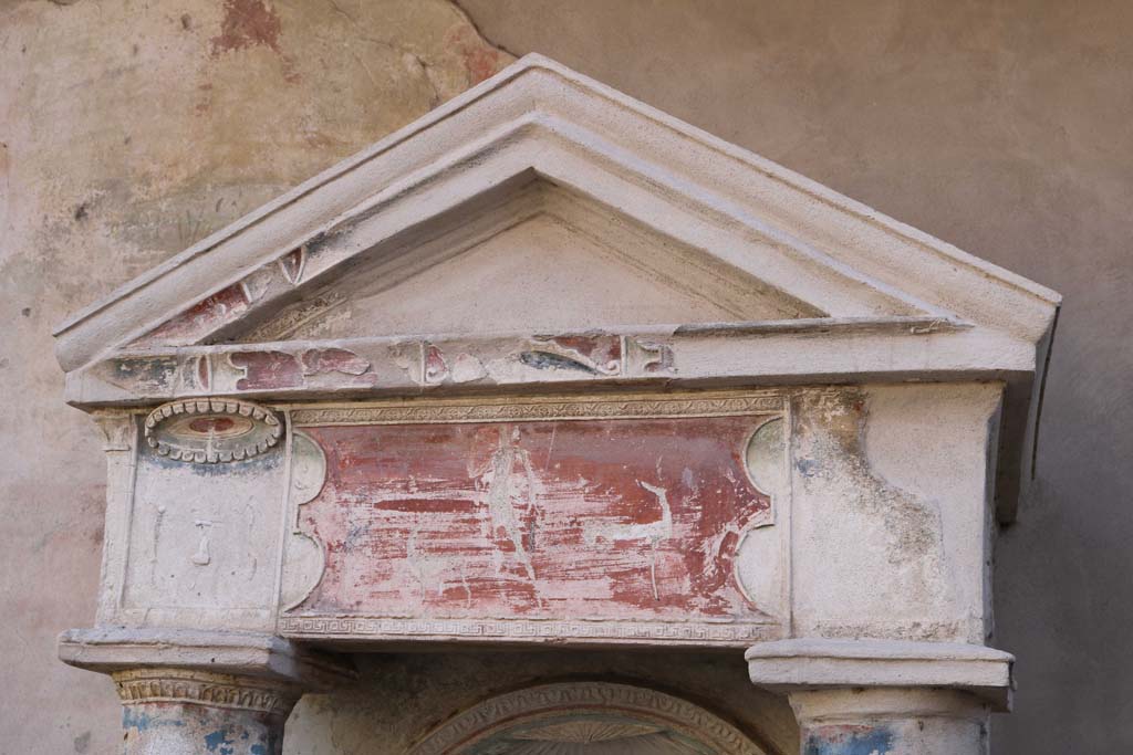 I.7.12 Pompeii. December 2018. 
Detail of raised stucco on upper front of nymphaeum showing Diana and two deer in relief. Photo courtesy of Aude Durand.
