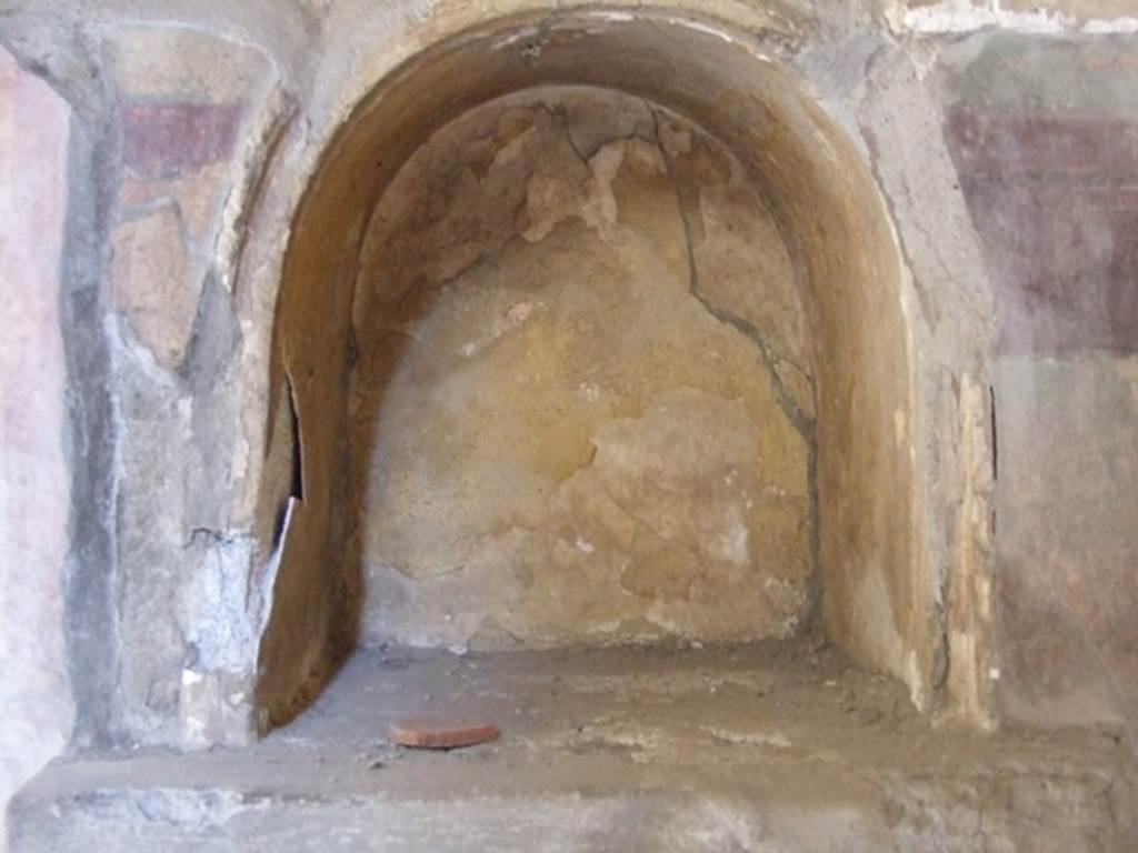 I.8.9 Pompeii. March 2009. Room 4, niche in west wall. According to PPM, the niche lararium had a white background
