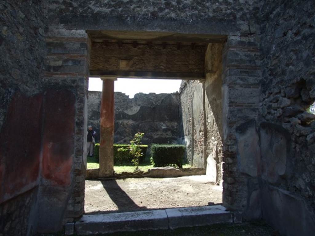 I.8.9 Pompeii.  March 2009.   Room 5. Tablinum.  Looking south to portico and garden.