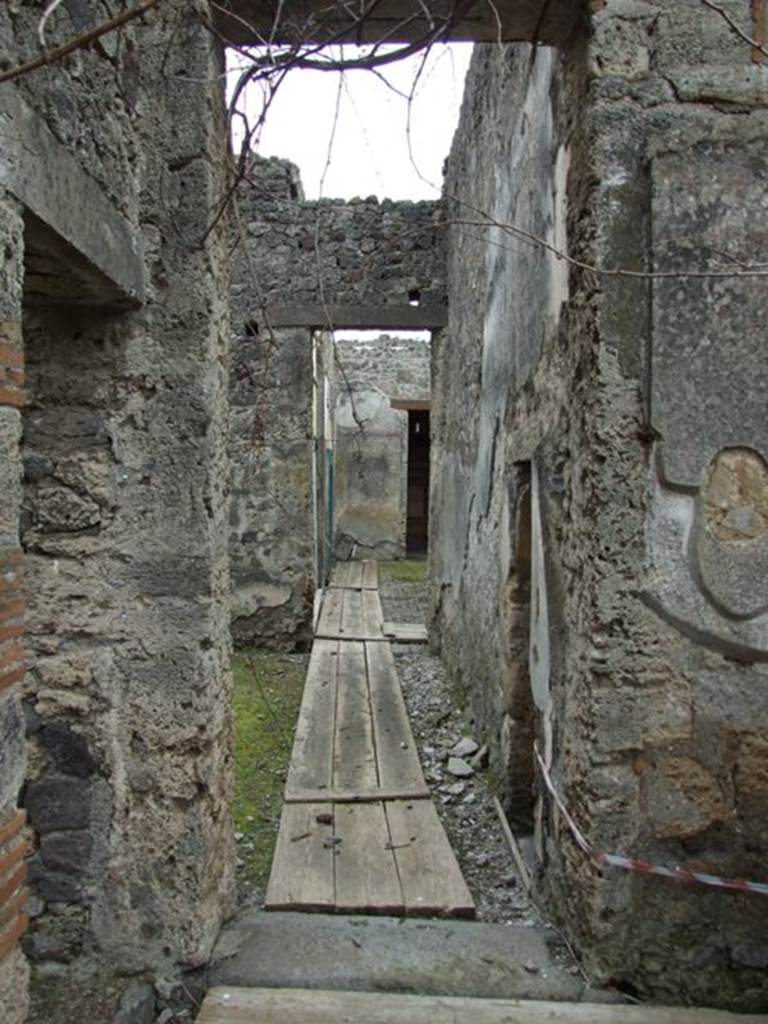 I.9.14 Pompeii. March 2009. Corridor, looking south,  on south side of doorway to room 4 (on left).