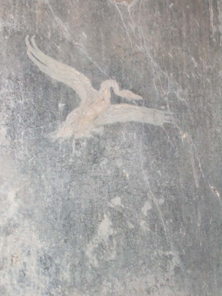 I.10.4 Pompeii. December 2005. 
Fauces or entrance corridor. Painting of bird (swan?) with wings outstretched.

