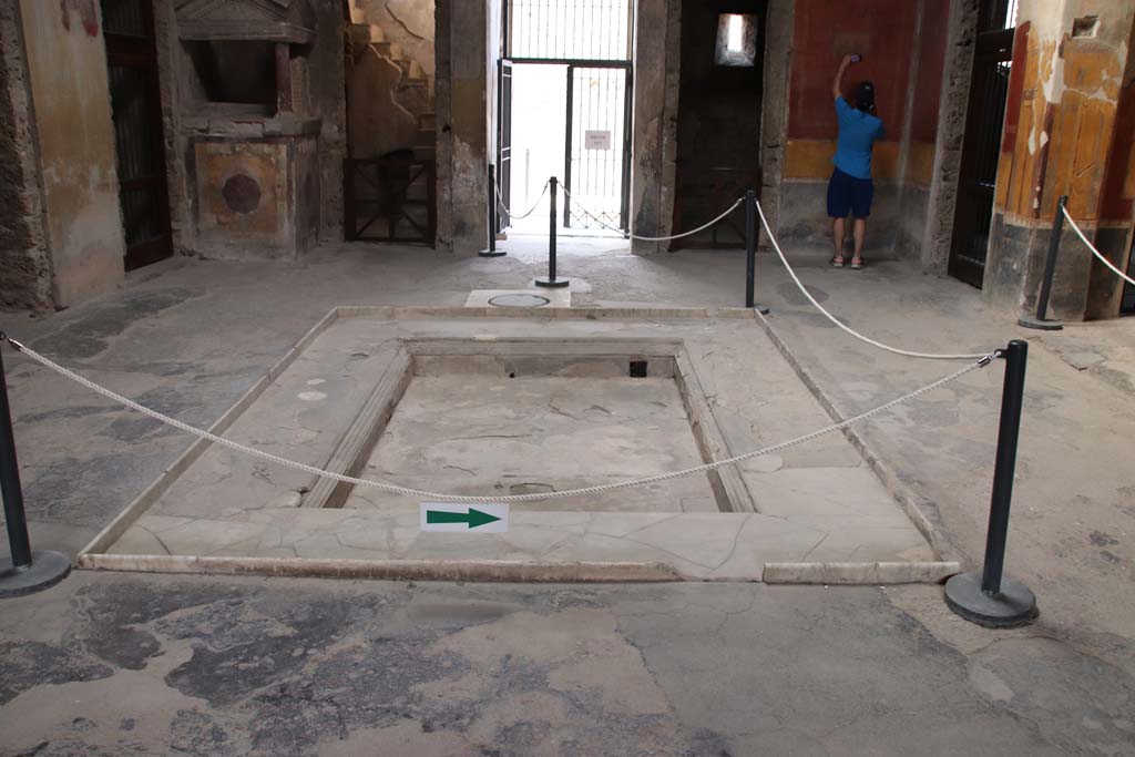 I.10.4 Pompeii. September 2021. 
Looking across impluvium towards north side of atrium and entrance doorway. Photo courtesy of Klaus Heese.
