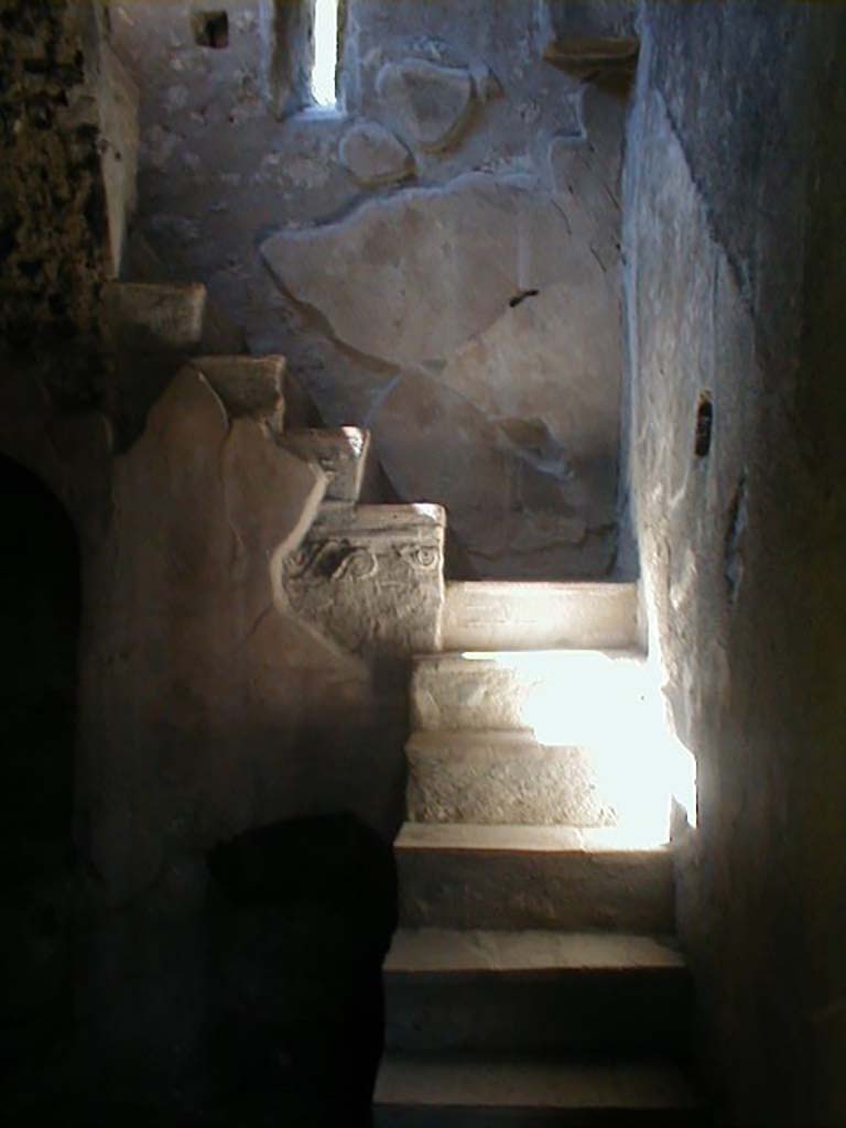 I.10.4 Pompeii. May 2004. Stone stairs in room 2.