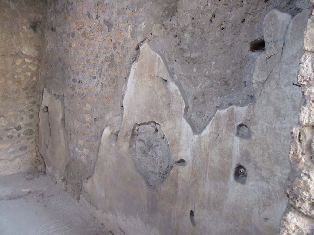 I.10.4 Pompeii. December 2006. Room 21, west wall.