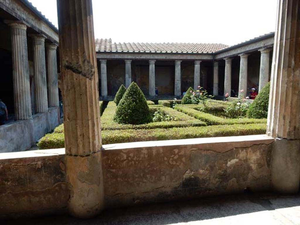 I.10.4 Pompeii. May 2015. Looking south along east side of peristyle garden, from north portico. Photo courtesy of Buzz Ferebee.

