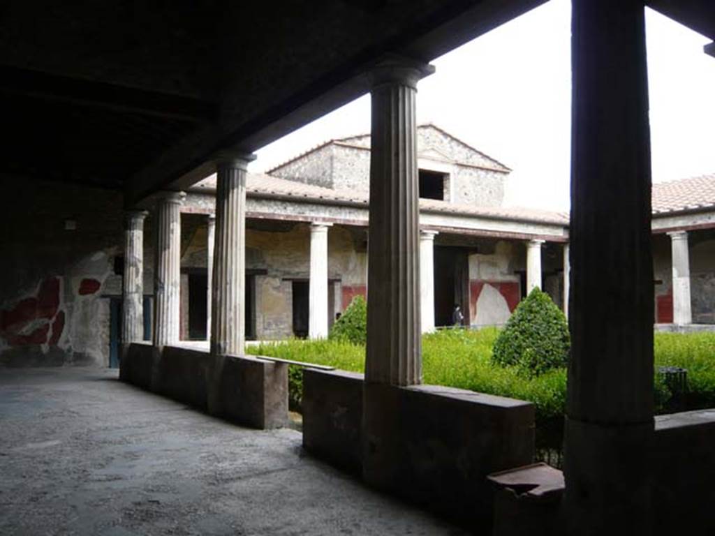 I.10.4 Pompeii. May 2012. Looking across north portico towards east side.  Photo courtesy of Buzz Ferebee.

