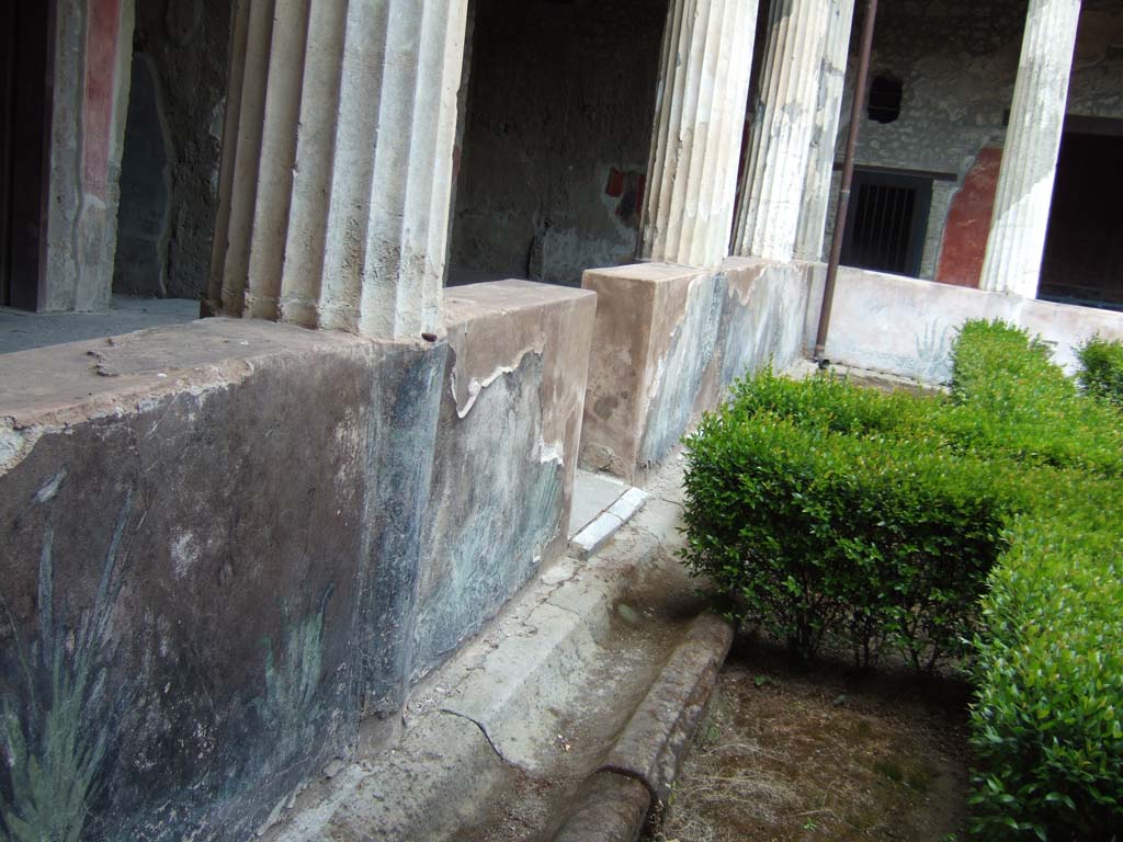 I.10.4 Pompeii. December 2006. Peristyle garden, detail of painted pluteus at north end.