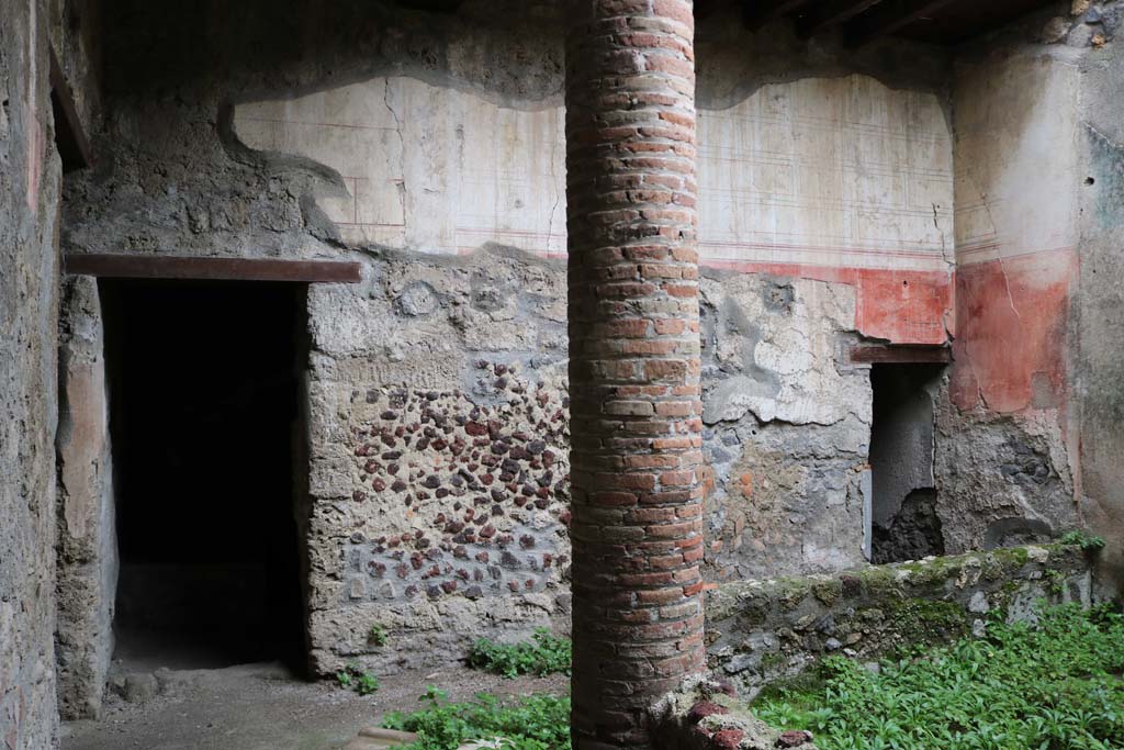 I.12.3 Pompeii. December 2018. 
Looking east from north passageway of garden area, to doorways of rooms 4 and 5. Photo courtesy of Aude Durand.
