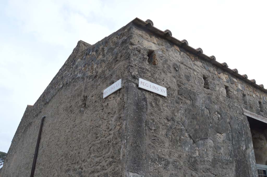 I.15.1 Pompeii, on right. March 2019. 
Upper corner of junction with Vicolo dei Fuggiaschi, on the left, and Via di Castricio, on right
Foto Taylor Lauritsen, ERC Grant 681269 DÉCOR.
