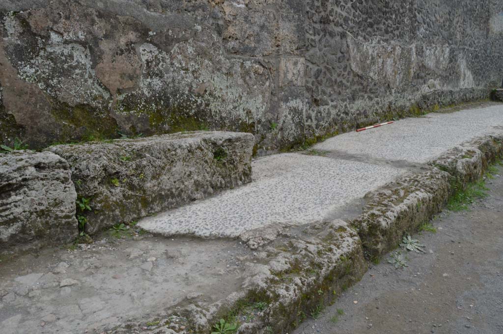 I.15.1 Pompeii. March 2019. Looking west along pavement from benches on west side of entrance doorway.
Foto Taylor Lauritsen, ERC Grant 681269 DÉCOR.
