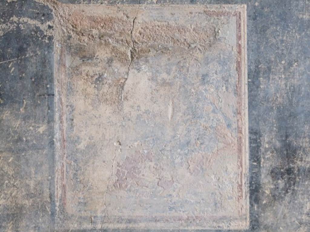 III.2.1 Pompeii.  March 2009.  Room 9.  Tablinum.  Remains of wall painting in central panel on east wall, possibly painting with Silenus.  See Bragantini, de Vos, Badoni, 1981. Pitture e Pavimenti di Pompei, Parte 1. Rome: ICCD. (p.246).