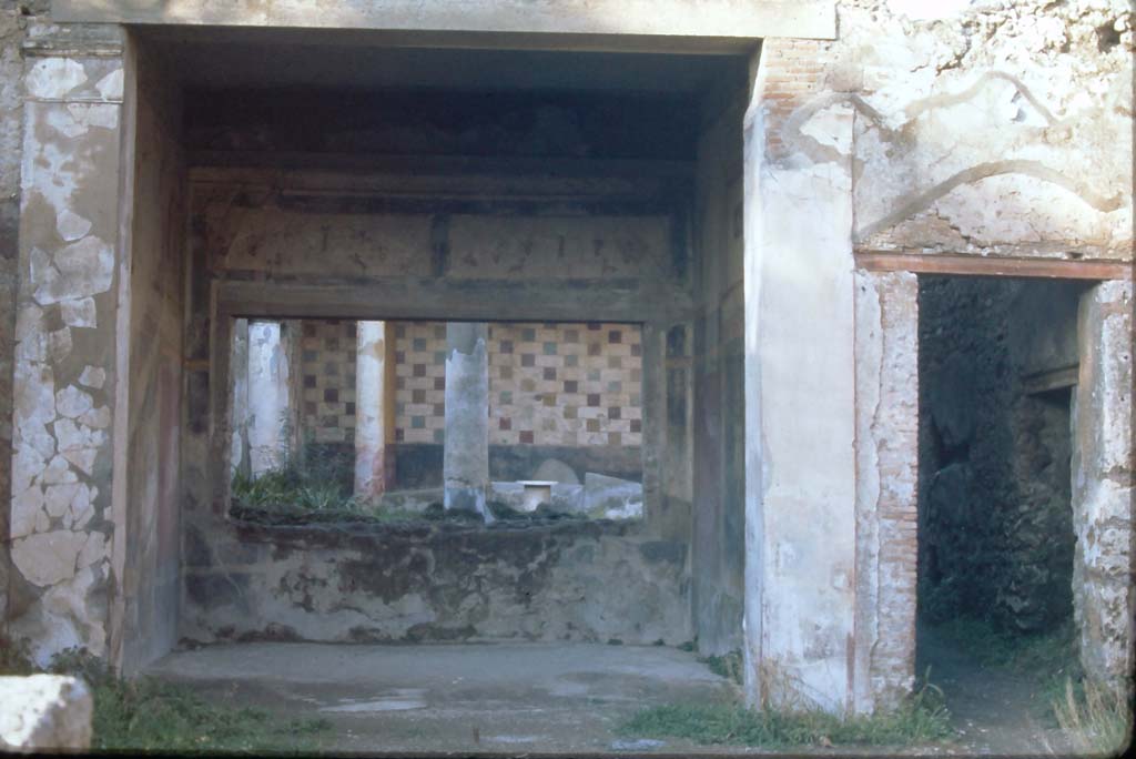 III.2.1 Pompeii, 4th December 1971. 
Looking north across atrium towards tablinum, and doorway to rear corridor and peristyle, on right.
Photo courtesy of Rick Bauer, from Dr.George Fays slides collection.
