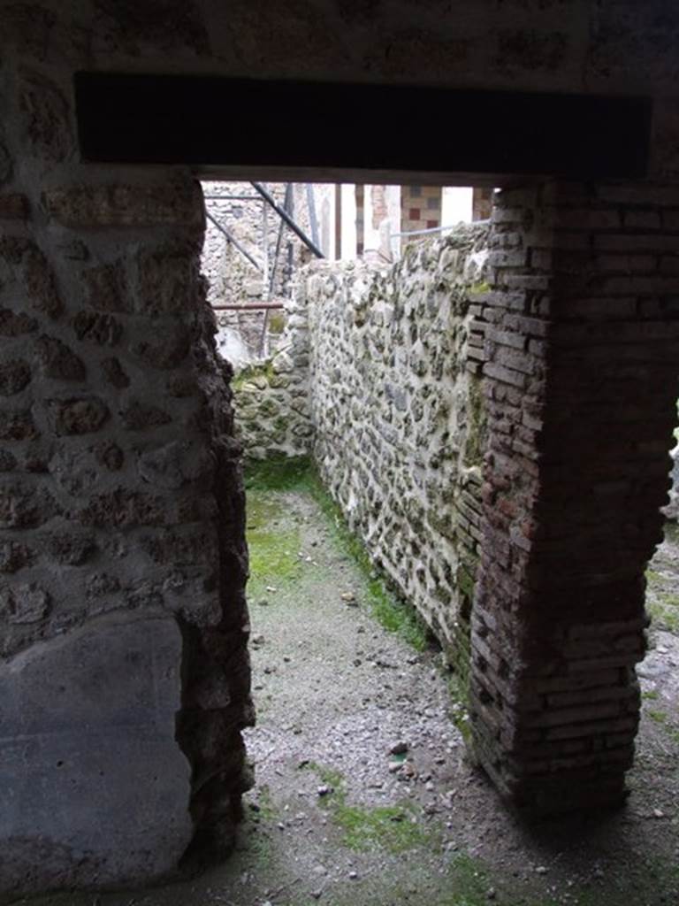 III.2.1 Pompeii.  March 2009.  Door to Room 16, from Portico.