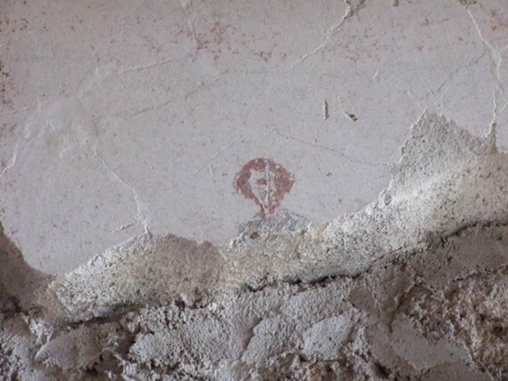 III.4.b. Pompeii.  March 2009. Room 4.  Exedra. Detail from east wall above door