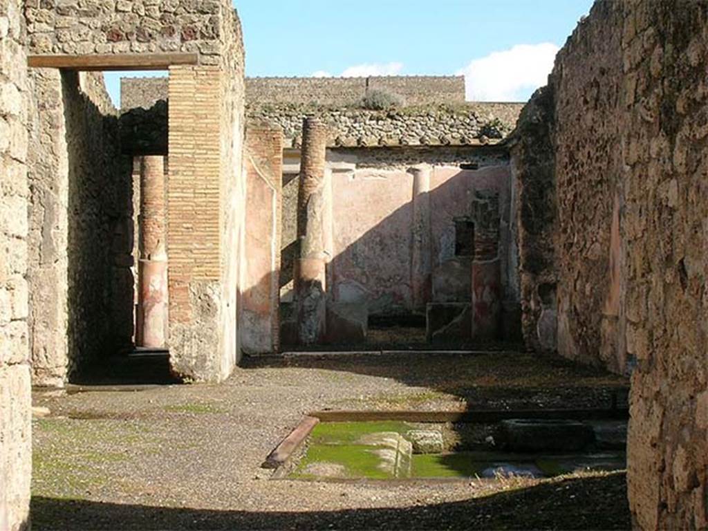 V.1.18 Pompeii. November 2012. Looking east across atrium b to tablinum g.
Photo Wikimedia, Courtesy of author Mentnafunangann. 
Use subject to a Creative Commons Attribution-Share Alike 3.0 Unported Licence
