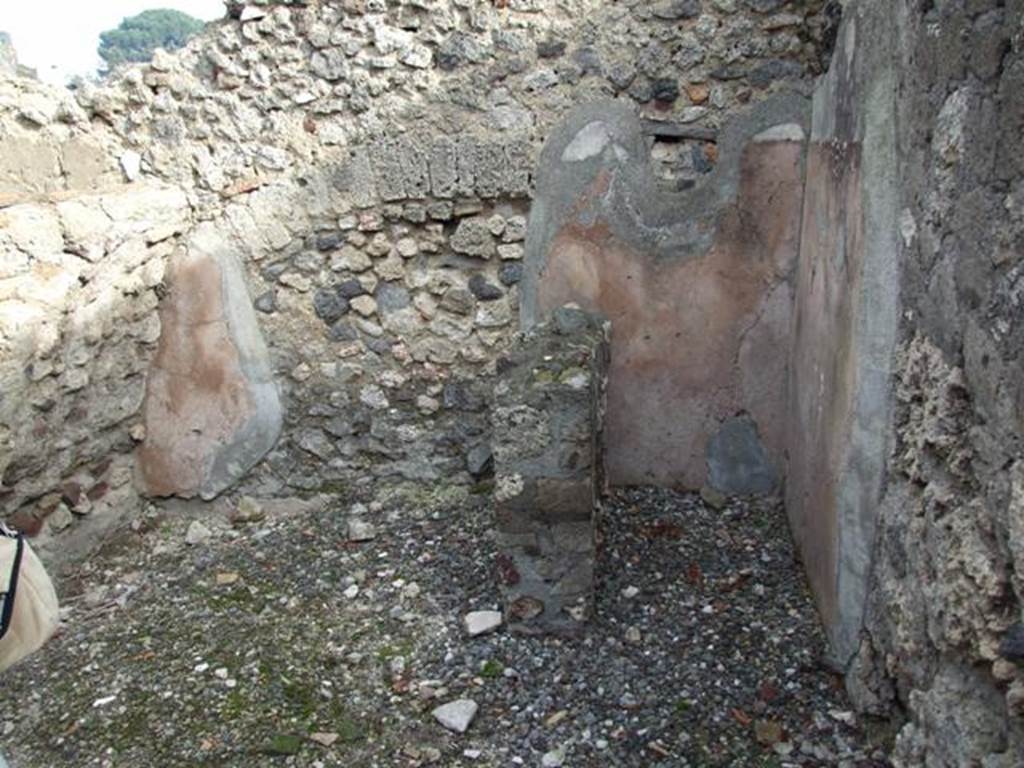 VI.5.3 Pompeii. December 2007. Room 7, Looking east towards latrine against east wall, at end of corridor in kitchen area.