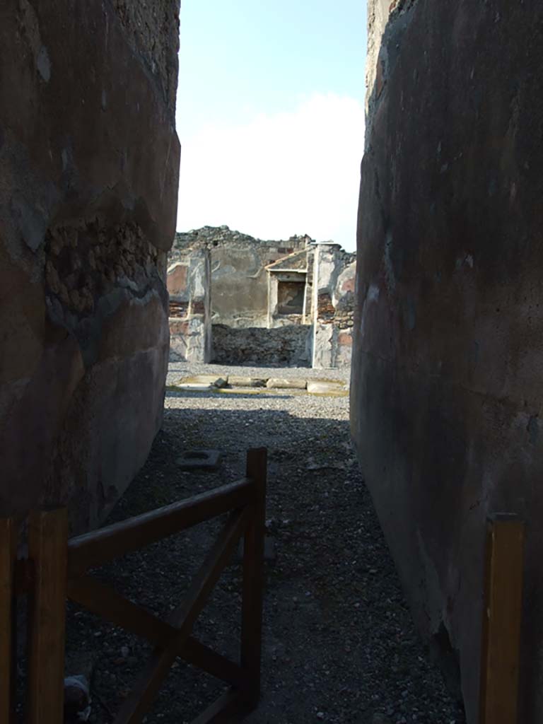VI.7.6 Pompeii. March 2009. Looking north along entrance corridor to atrium, tablinum and garden.