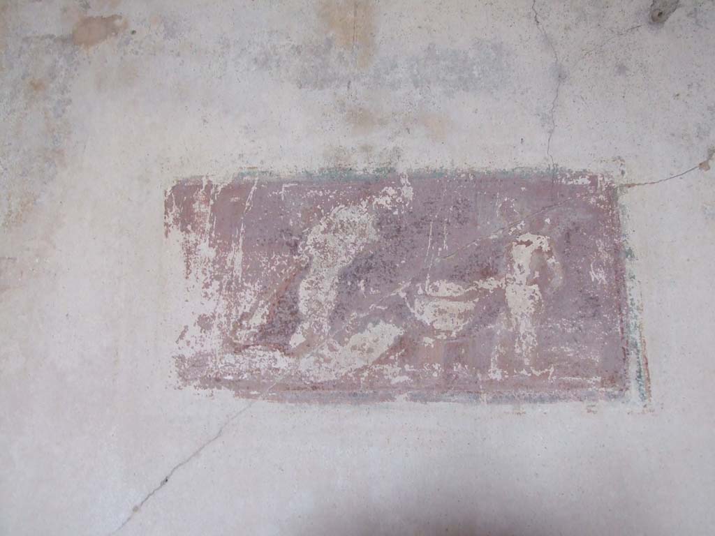 VI.7.18 Pompeii. December 2006. Painted panel of two cupids, on west end of south wall of oecus/cubiculum to south of peristyle. 