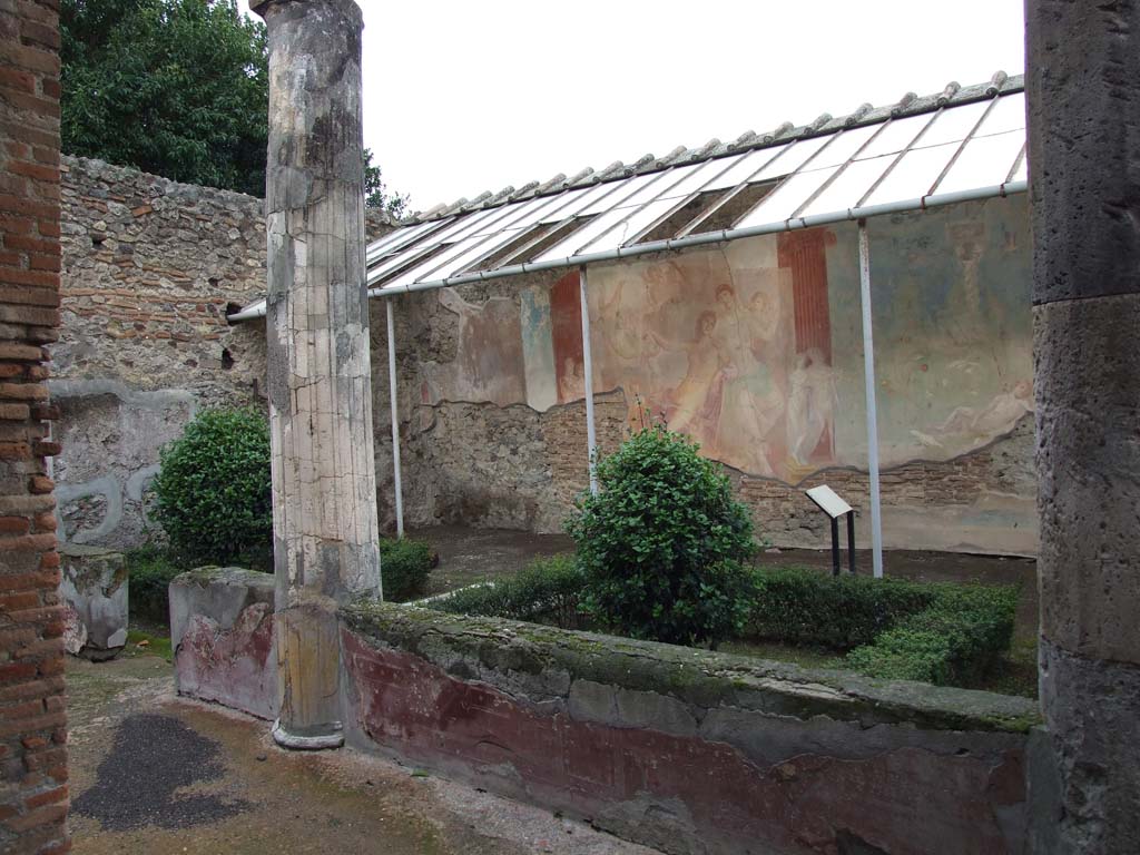 VI.7.18 Pompeii. December 2006. Looking towards north wall of peristyle, and large wall painting of Adonis ferito and Aphrodite.