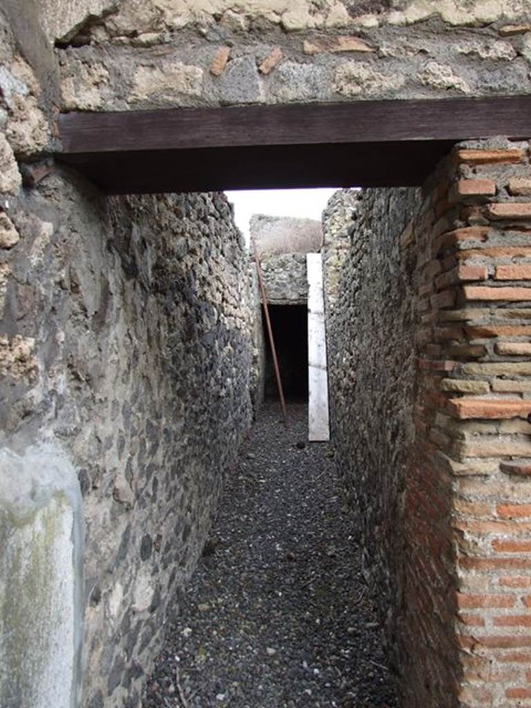 VI.7.20 Pompeii. December 2006. Looking north along corridor to kitchen and latrine.