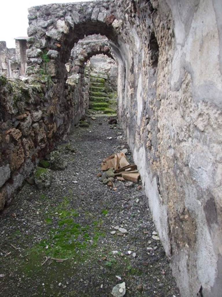 VI.10.7 Pompeii.  March 2009.  Room 15.  Garden area.  South side.  Corridor at rear of fountains looking west.