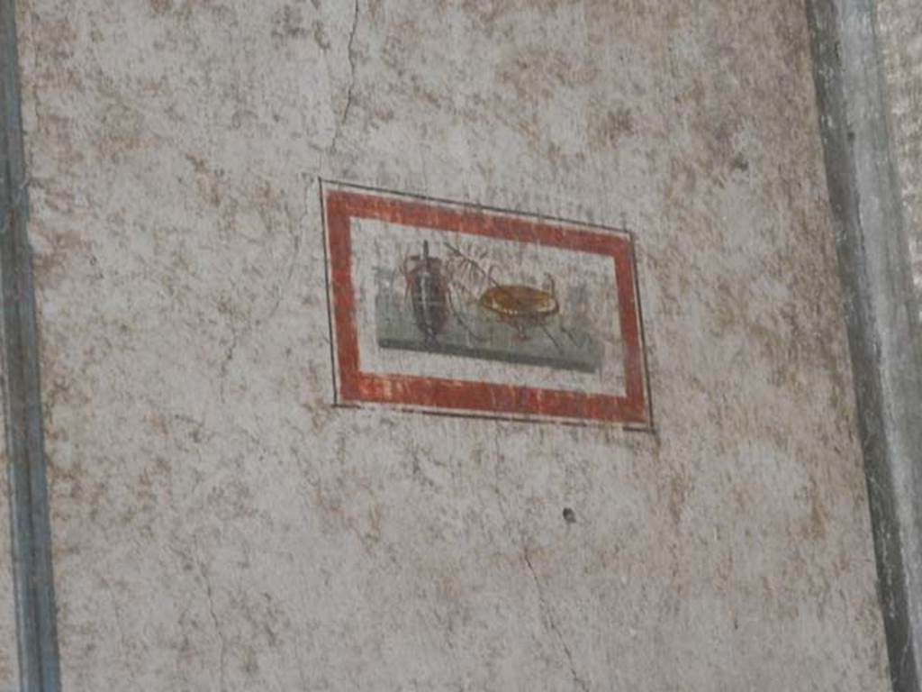 VI.15.1 Pompeii. May 2017. Painted panel from north end of west wall. Photo courtesy of Buzz Ferebee.
