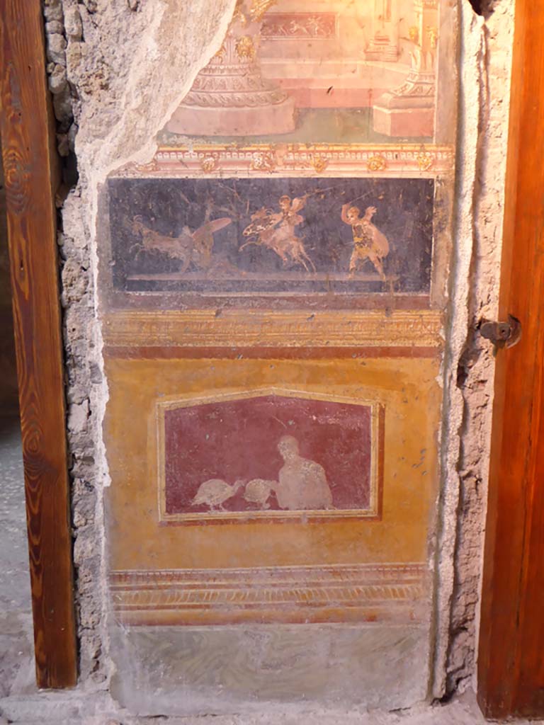 VI.15.1 Pompeii. January 2017. 
East wall of atrium, detail of painted decoration between doorways to bedroom on left of main entrance and oecus on south side.
Foto Annette Haug, ERC Grant 681269 DÉCOR.

