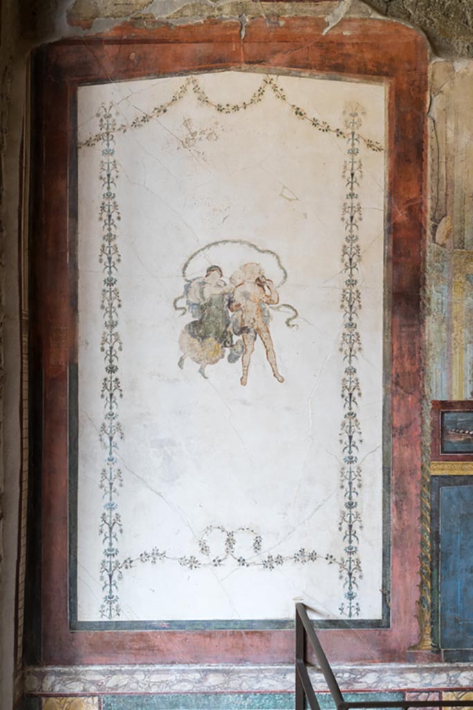 VI.15.1 Pompeii. March 2023. 
Painted panel at west end of north wall of exedra. Photo courtesy of Johannes Eber.
