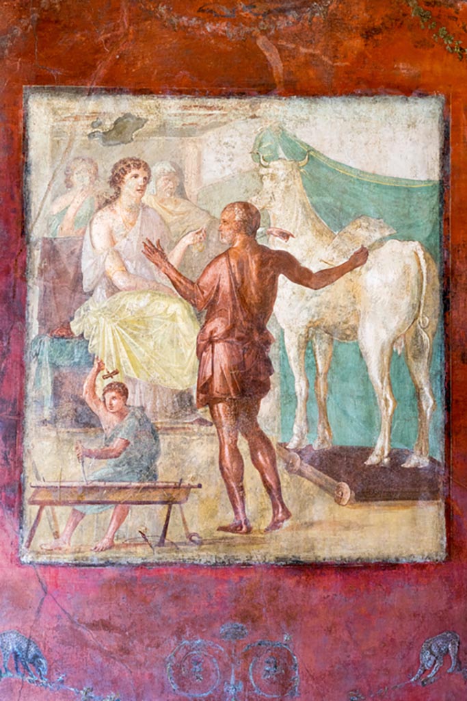 VI.15.1 Pompeii. March 2023. 
Central painting of Daedalus showing Pasiphae the wooden cow, from centre of north wall of exedra.
Photo courtesy of Johannes Eber.
