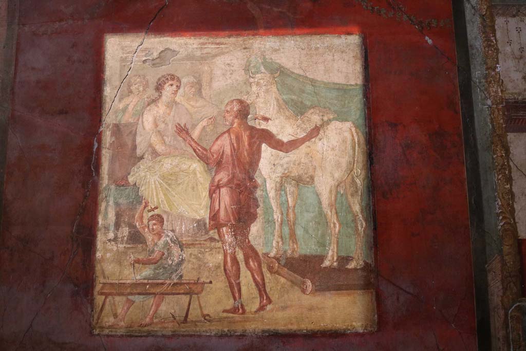 VI.15.1 Pompeii. December 2018. 
North wall of exedra, central wall painting of Daedalus showing Pasiphae the wooden cow. Photo courtesy of Aude Durand.
