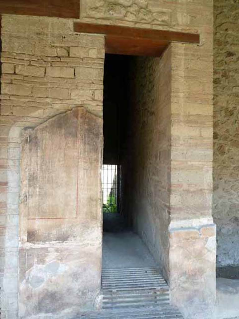 VI.16.7 Pompeii. May 2010. Looking east on east portico towards entrance to corridor 01, leading to VI.16.6.