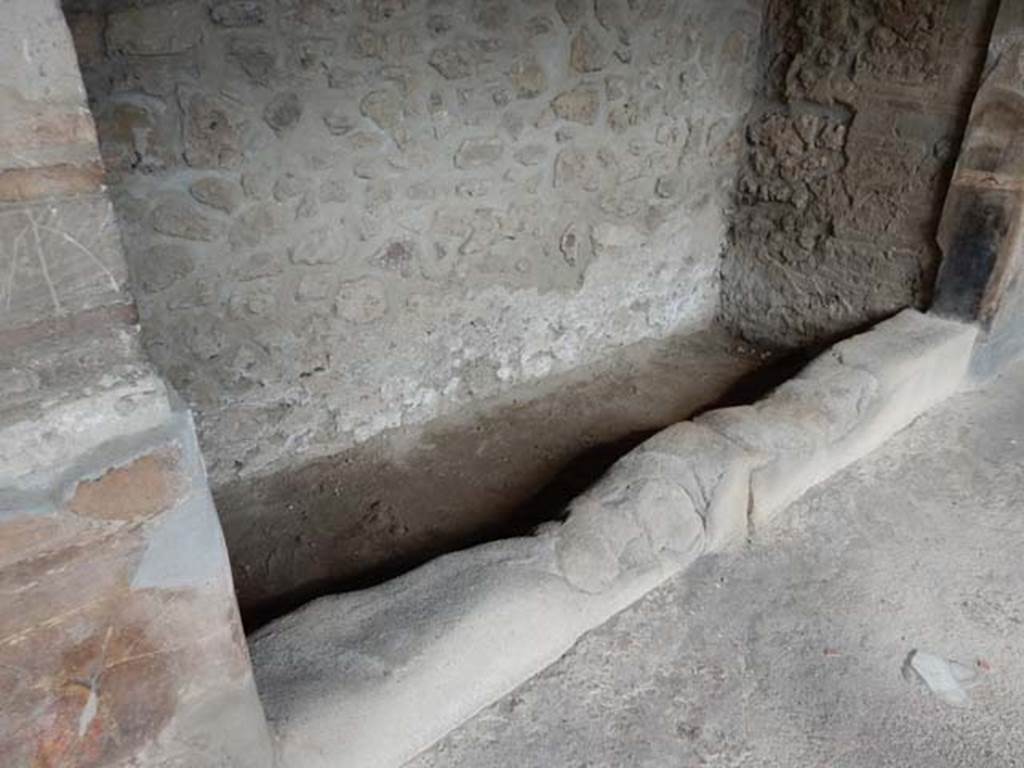 VI.16.7 Pompeii. May 2016. Shallow space 03, on east side of portico, detail of space originally filled with a wooden cupboard. Photo courtesy of Buzz Ferebee.
