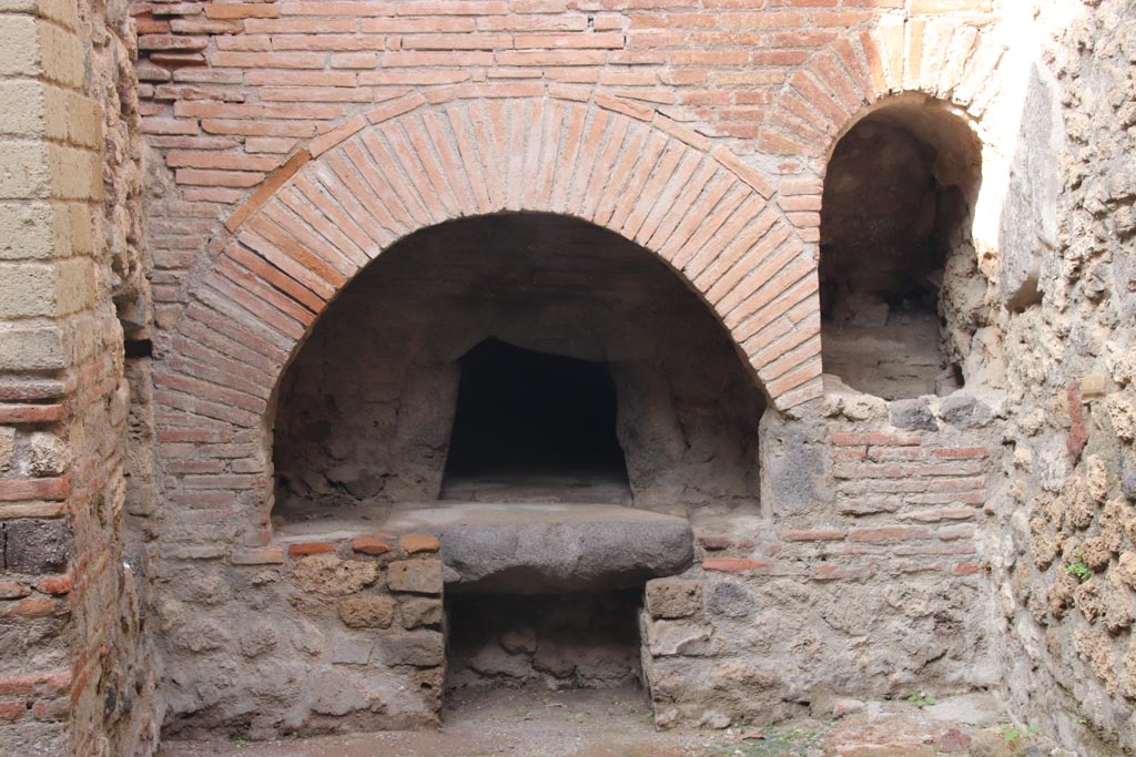 VII.1.46 Pompeii. October 2023. Looking north towards detail of oven in kitchen area. Photo courtesy of Klaus Heese.