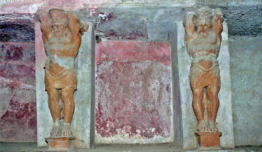 VII.5.24 Pompeii. 2015/2016.
Tepidarium (37), telamon separating the niches from north wall at east end. 
Photo courtesy of Giuseppe Ciaramella.
