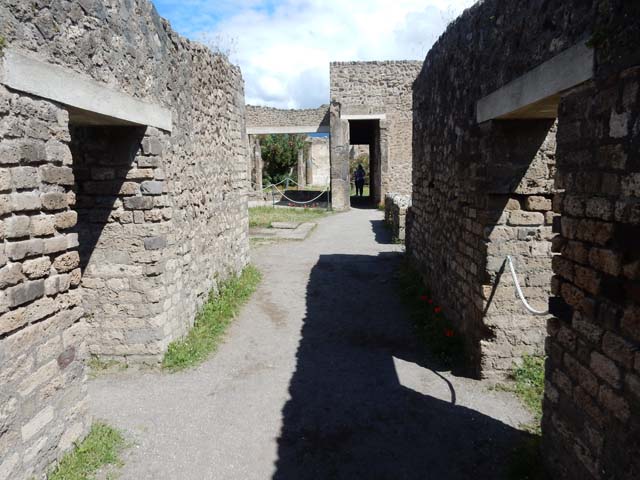 VII.7.2 Pompeii, May 2018. 
Looking north along entrance corridor “a”, with doorway to room “b” on left, and room “c” on right. Photo courtesy of Buzz Ferebee.
