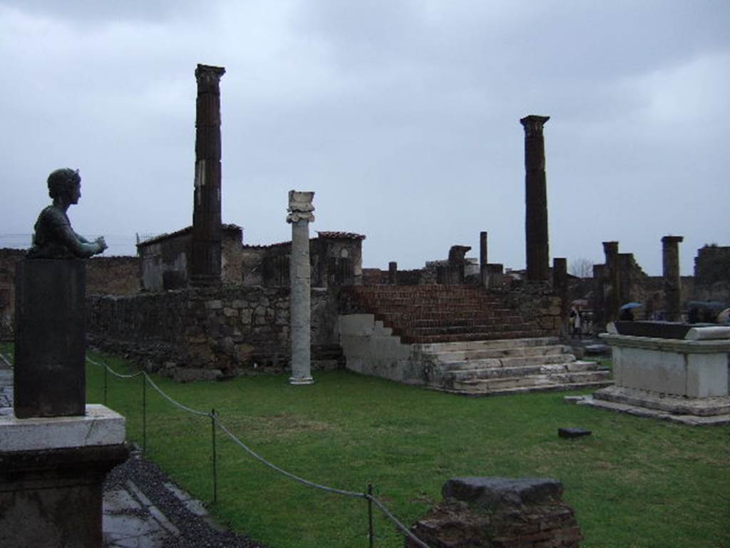 VII.7.32 Pompeii.  December 2005. Looking north east towards Altar, Podium and Cella. The statue of  Artemis is in front of the third column on the west side.
