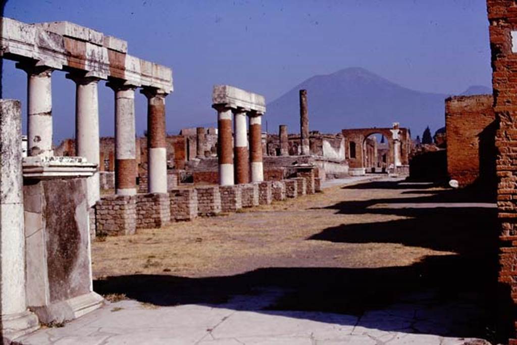 VII.8 Pompeii Forum. 1974. Looking north-west across the east side, from Eumachia’s portico.  Photo by Stanley A. Jashemski.   
Source: The Wilhelmina and Stanley A. Jashemski archive in the University of Maryland Library, Special Collections (See collection page) and made available under the Creative Commons Attribution-Non Commercial License v.4. See Licence and use details. J74f0703
