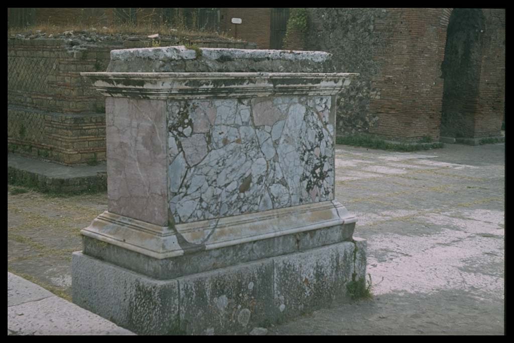 VII.8 Pompeii Forum. North side of inscribed marble base for figure on horse. 
Photographed 1970-79 by Günther Einhorn, picture courtesy of his son Ralf Einhorn.
