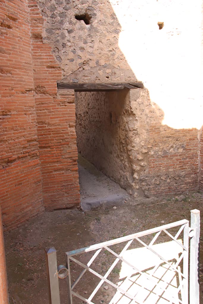 VII.9.1 Pompeii. October 2023.
Room 7. North side of entrance, looking across room towards doorway to stairway.
Photo courtesy of Klaus Heese.
